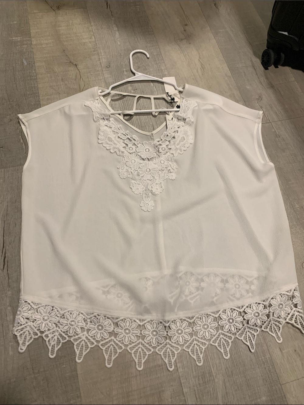 Womenβs White Lace-Trim Sleeveless Top